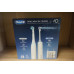 Brush Oral-B Oral-B Oral Health Center + iO Series 4 White set elektrického zubního kartáčku a ústní sprchy, bílá